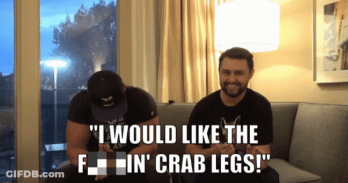 Two Men On Couch Saying I Would Like The F In Crab Legs GIF