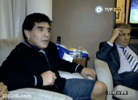 Two Men On Couch With TVP Vivo Screen GIF