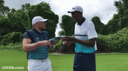 Two Men On Golf Course Shirt Says Lacoste GIF