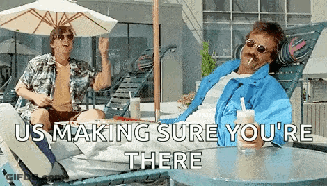 Two Men On Lounge Chairs By Pool, One Smoking GIF