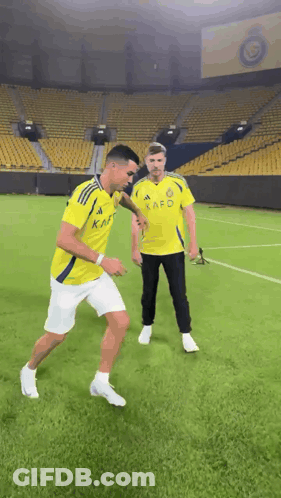 Two Men On Soccer Field One In Kafo Jersey GIF