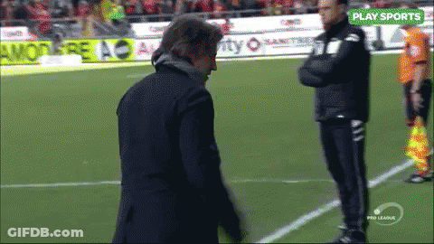 Two Men On Soccer Field Saying Play Sports GIF