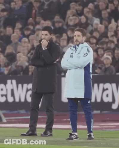 Two Men On Soccer Field With Betway Sign GIF