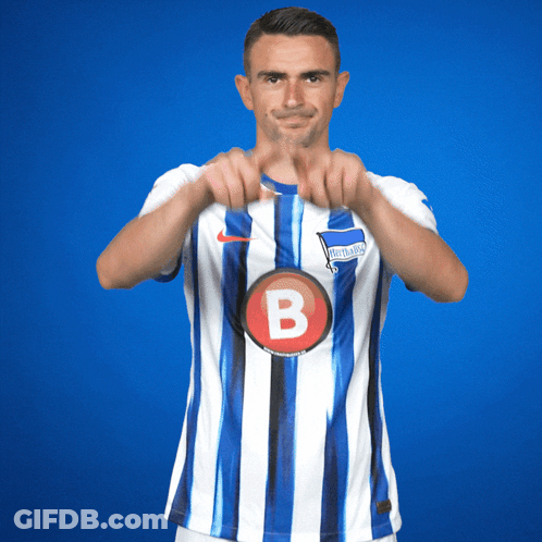 Two Men On Soccer Field With Makita Ad GIF