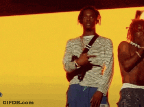 Two Men On Stage One Holding Gun GIF