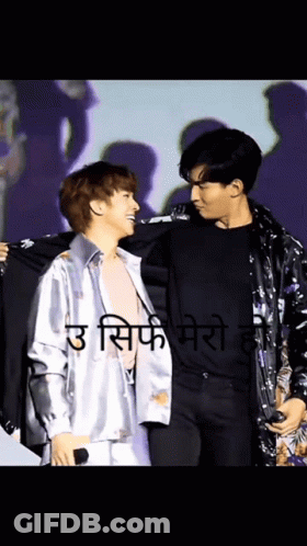 Two Men One Holding Jacket Over Shoulder GIF