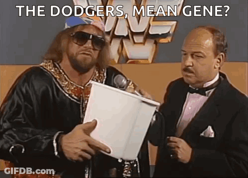 Two Men One Holding Microphone One Holding Paper GIF