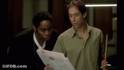 Two Men One Holding Pool Cue In Pool Room GIF