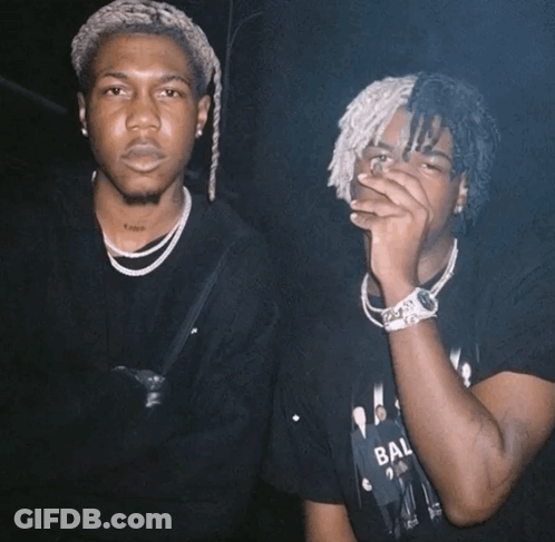Two Men One In Bal Shirt GIF