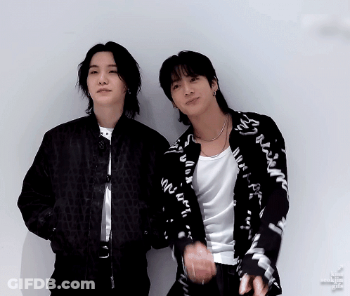Two Men One In Black Jacket GIF