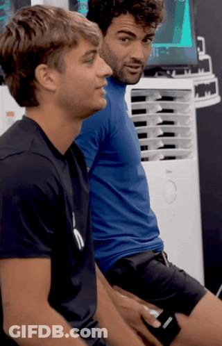 Two Men One In Black Puma Shirt GIF