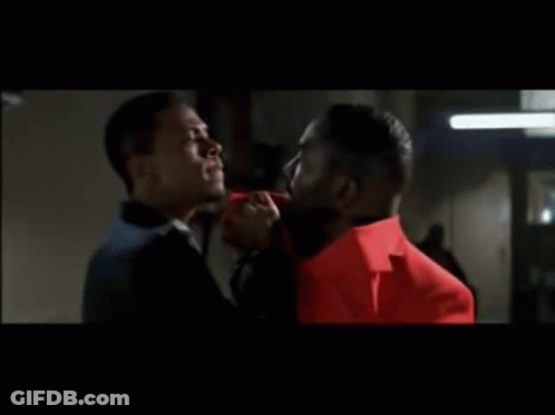 Two Men One In Red Jacket GIF