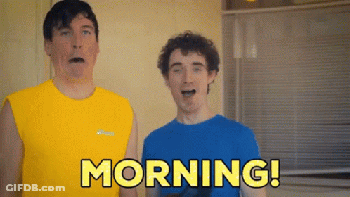 Two Men One In Yellow Tank Top Saying Morning GIF