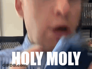 Two Men One Raising Fist In Air GIF