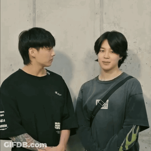 Two Men One Wearing Real World Shirt GIF