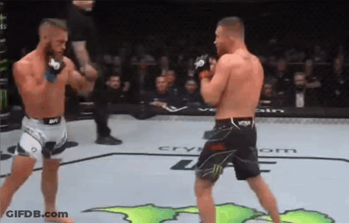 Two Men One Wearing Smack Down Shirt GIF