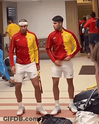 Two Men One Wearing Spain Red And Yellow Shirt GIF