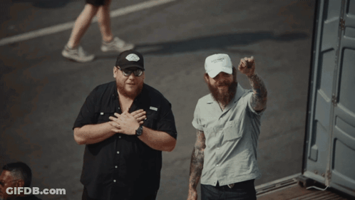 Two Men One Wearing White Hat Saying I Love You GIF