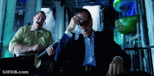 Two Men, One With Green Boxing Glove And Letter S GIF