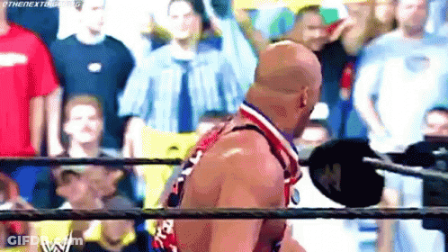 Two Men One With Medal GIF