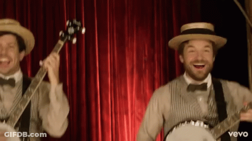 Two Men Playing Banjo And Guitar With Vevo GIF