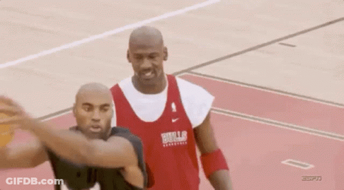 Two Men Playing Basketball With Bulls Jersey GIF