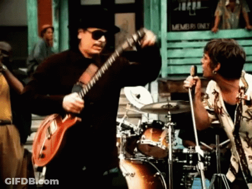 Two Men Playing Guitar And Drums GIF