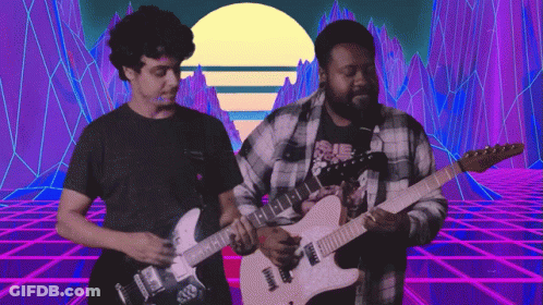 Two Men Playing Guitars In Front Of A Colorful Background GIF