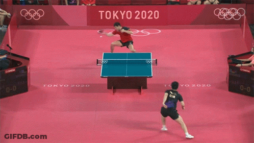 Two Men Playing Ping Pong On Tokyo 2020 Court GIF