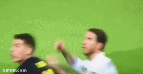 Two Men Playing Soccer GIF