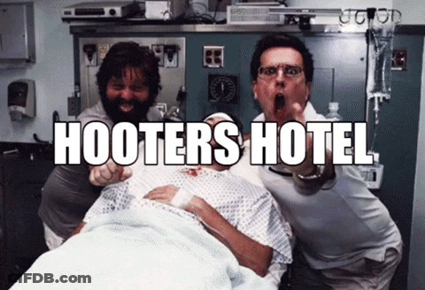 Two Men Pointing At Hospital Bed GIF