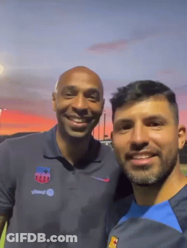 Two Men Posing One With Nike Logo GIF