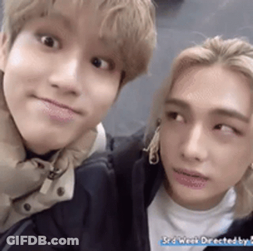 Two Men Posing With 3Rd Week Text GIF