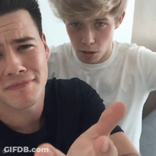 Two Men Posing With Funny Face GIF