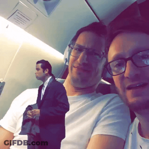 Two Men Reaction To Confused Actor John Travolta GIF