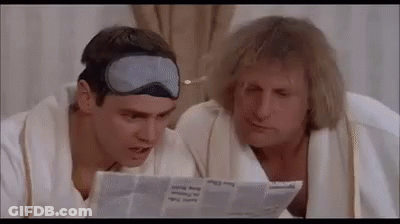 Two Men Reading Newspaper Wearing Sleep Masks GIF