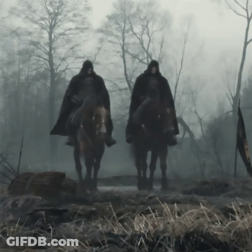 Two Men Riding Horses In Foggy Field GIF