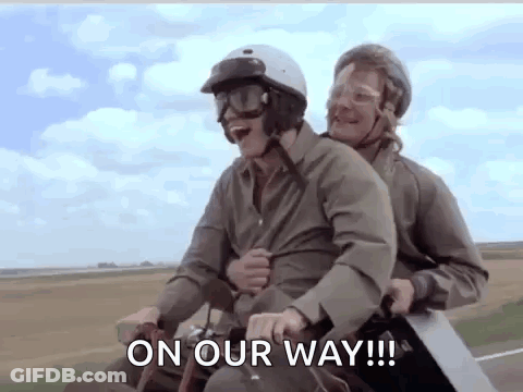 Two Men Riding Motorcycle Saying On Our Way GIF