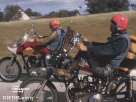 Two Men Riding Motorcycles Frisa Film & Audio Archive GIF