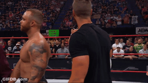 Two Men Ring With Fake Love Care Sign GIF