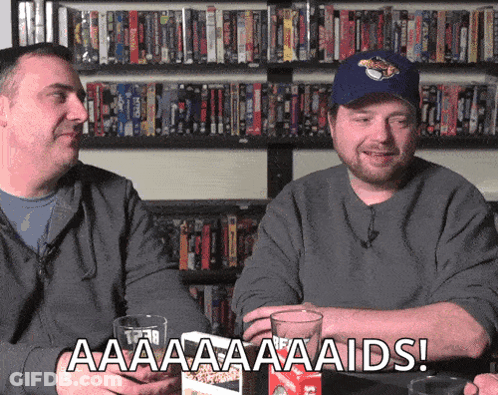 Two Men Saying Aa A A A Aids GIF