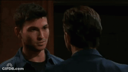 Two Men Saying Lets Just Take It Down A Notch Please GIF