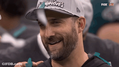 Two Men Shaking Hands And Walking Away GIF