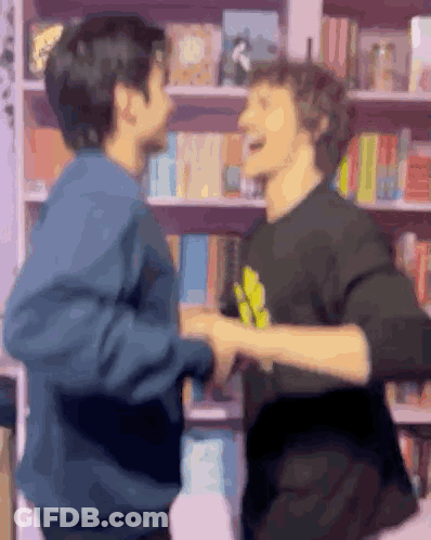 Two Men Shaking Hands GIF