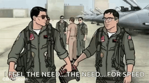 Two Men Shaking Hands In Front Of Planes GIF