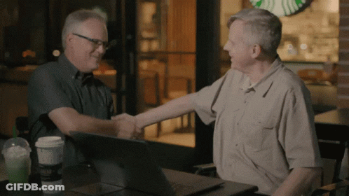 Two Men Shaking Hands In Front Of Starbucks Logo GIF