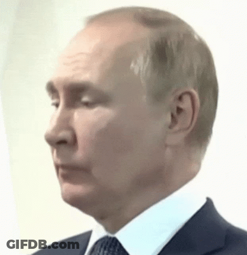 Two Men Shaking Hands On Red Carpet GIF