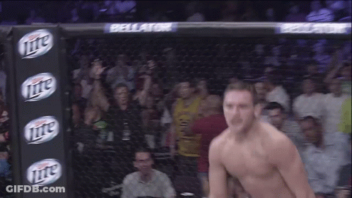 Two Men Shaking Hands Reebok Sign GIF