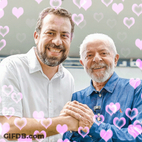 Two Men Shaking Hands With Pink Hearts GIF