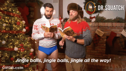 Two Men Singing In Front Of Christmas Tree With Jingle Balls Jingle Balls Jingle All The Way GIF